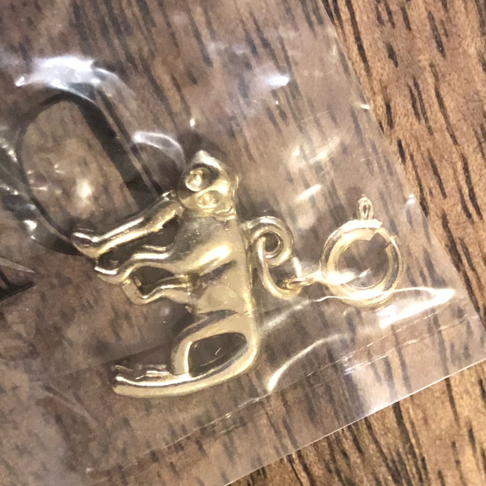 Monkey gold charm by DIAMOND INTERNATIONAL